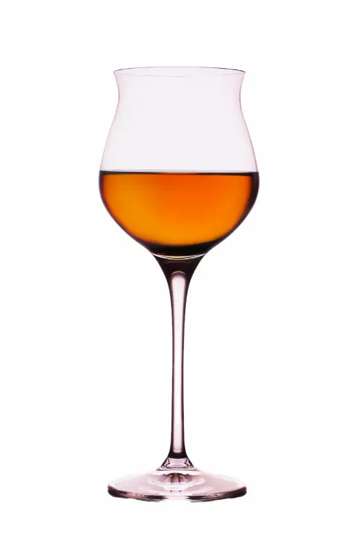 Glass of dessert wine (orange in color)